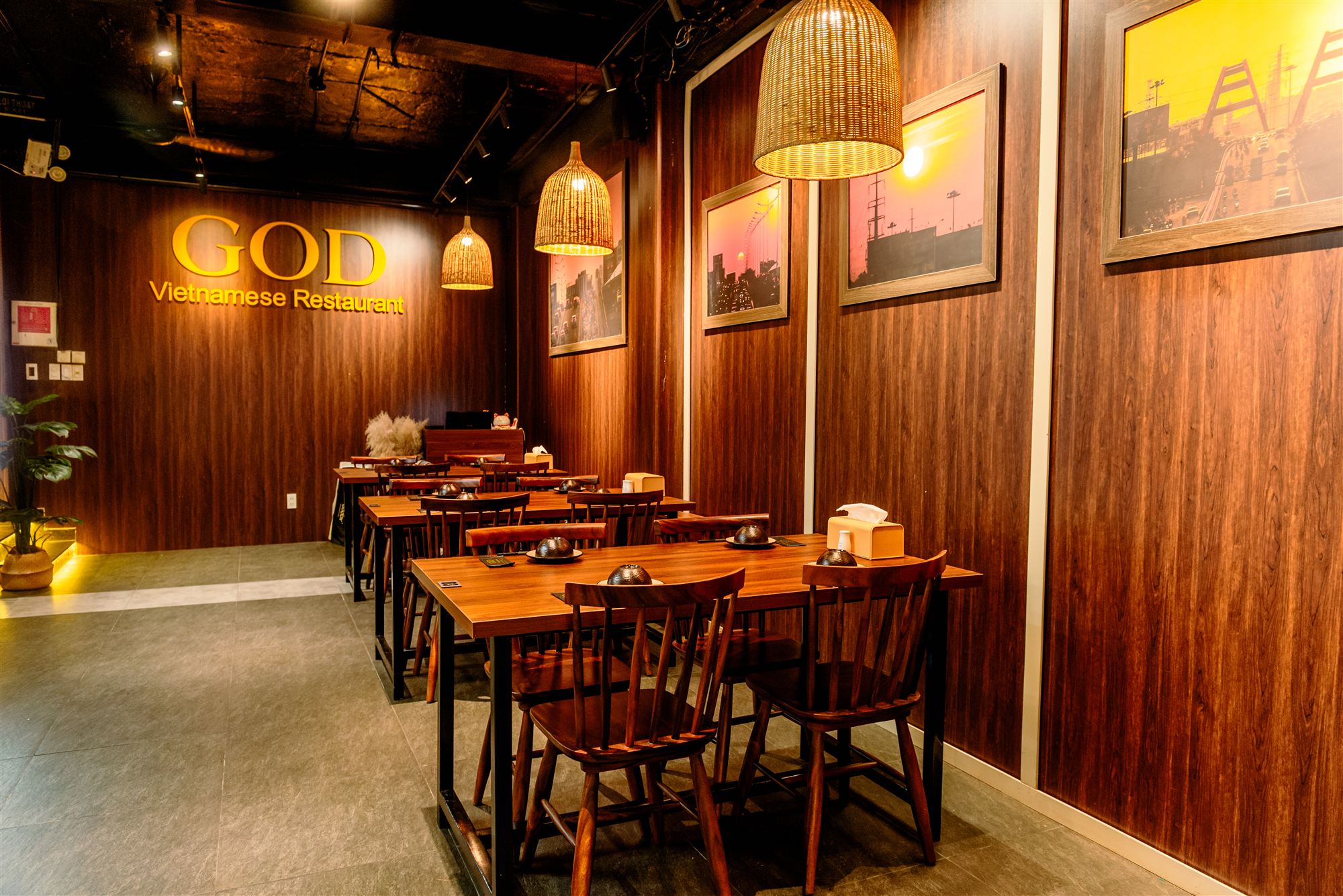 Warm wood dining hall near the entrance at GOD-RESTAURANT