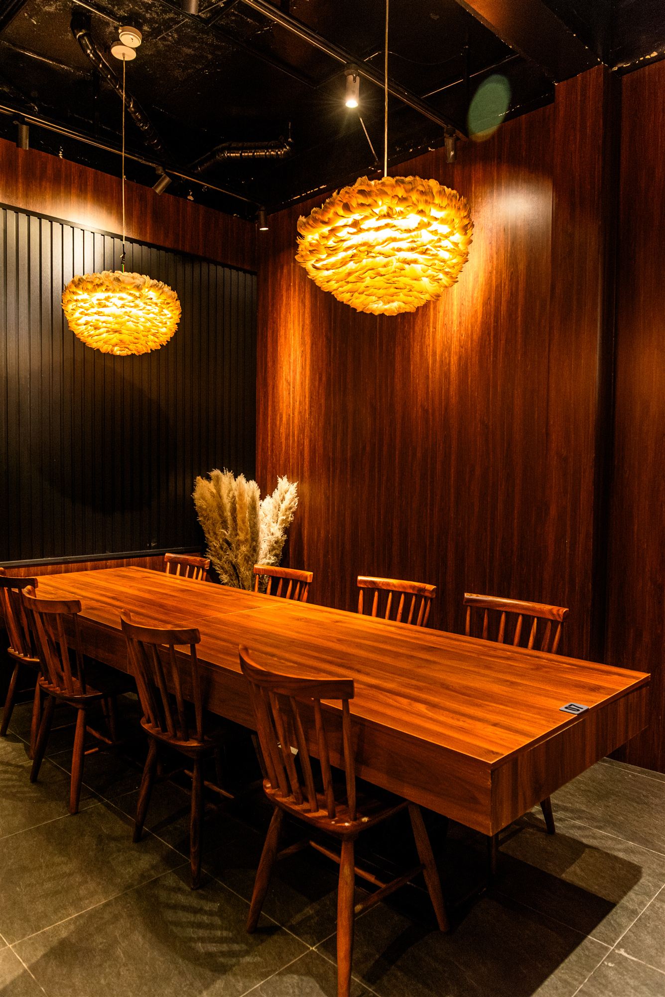Warm lantern light and intimate seating corner