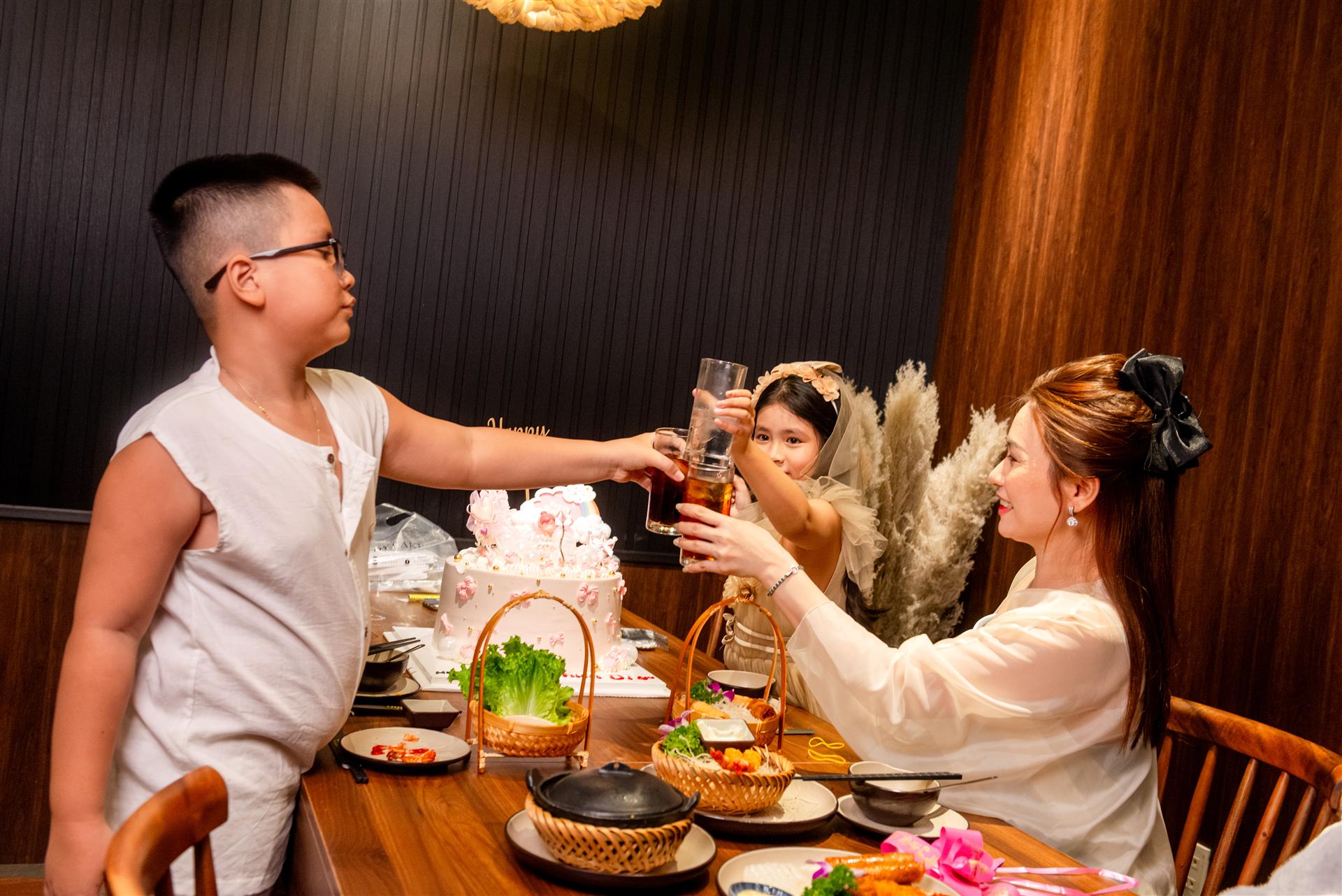 Family toast celebration at GOD-RESTAURANT